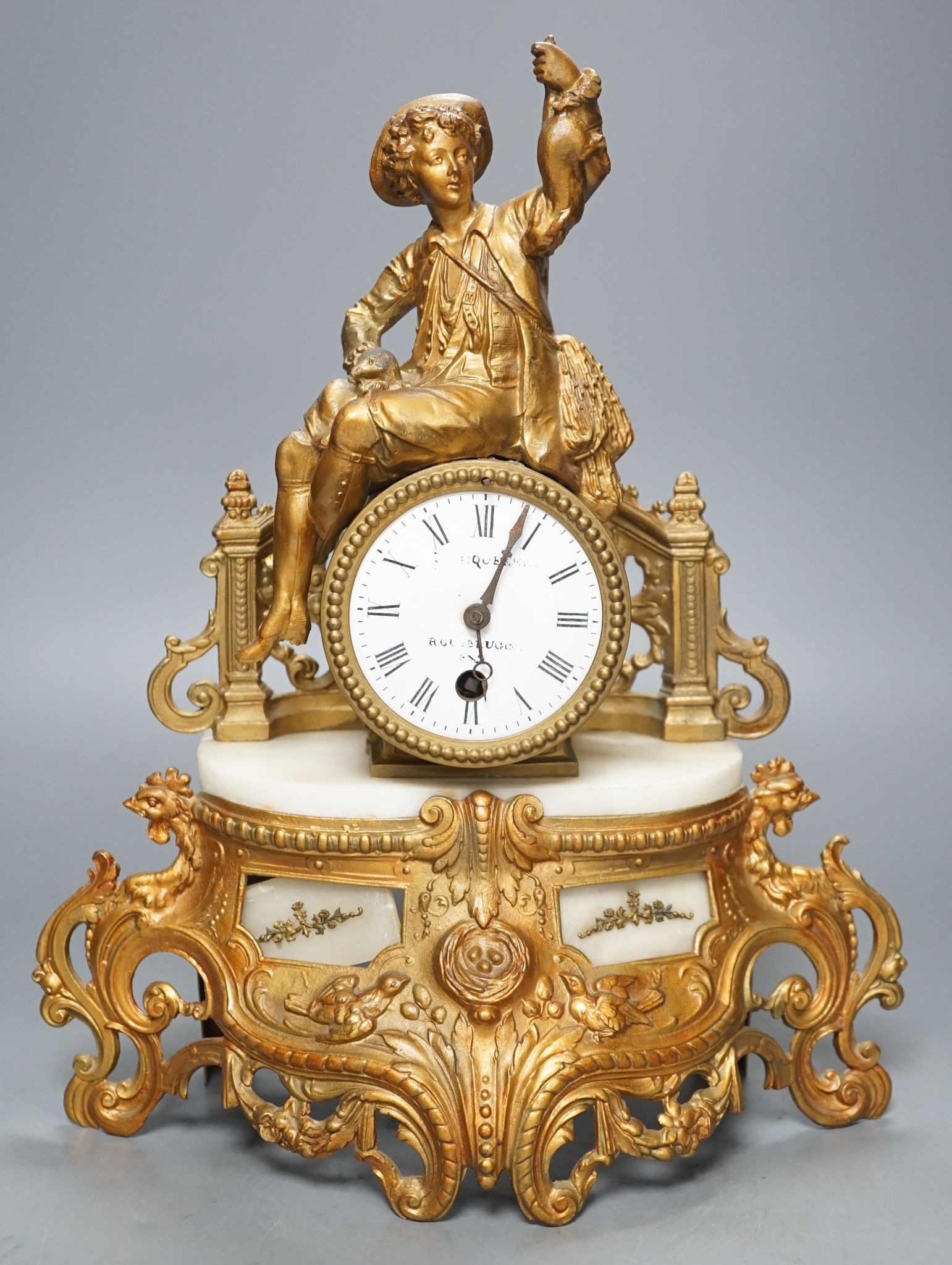 A 19th century French gilt spelter and Alabaster mantel clock, with pendulum, 36cms high.